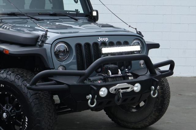 used 2015 Jeep Wrangler Unlimited car, priced at $26,991