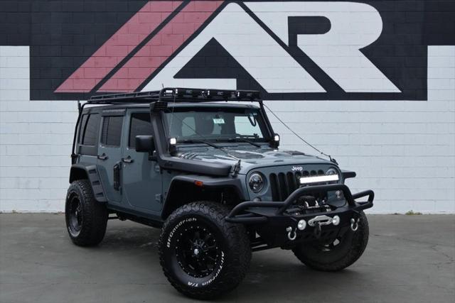 used 2015 Jeep Wrangler Unlimited car, priced at $26,991