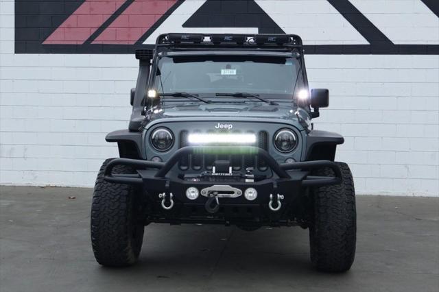 used 2015 Jeep Wrangler Unlimited car, priced at $26,991