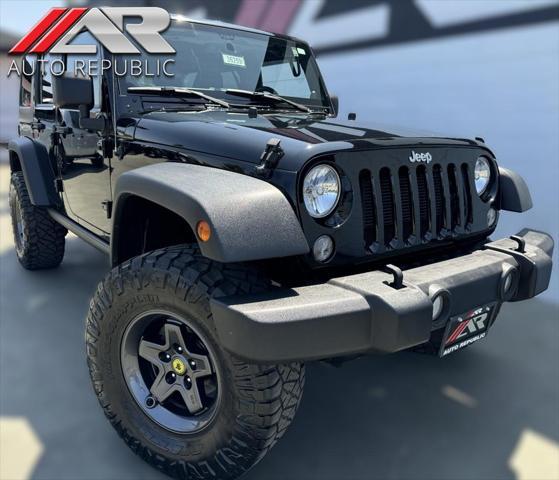 used 2014 Jeep Wrangler Unlimited car, priced at $25,992