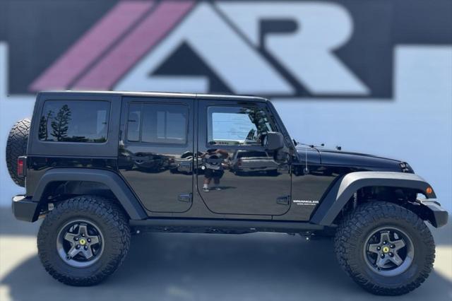 used 2014 Jeep Wrangler Unlimited car, priced at $25,992