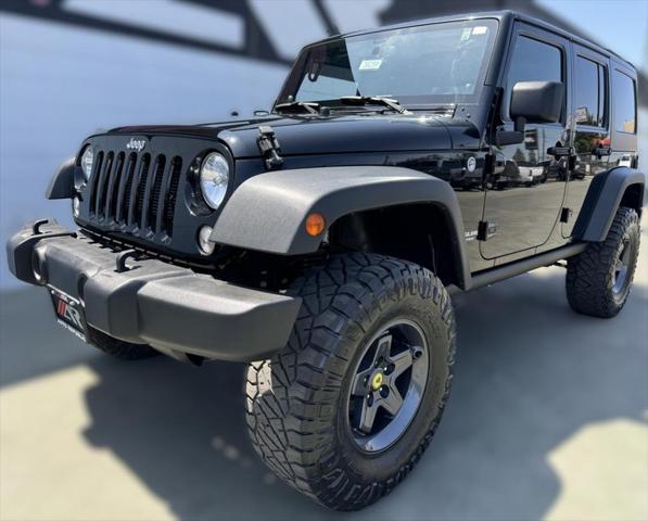 used 2014 Jeep Wrangler Unlimited car, priced at $25,992