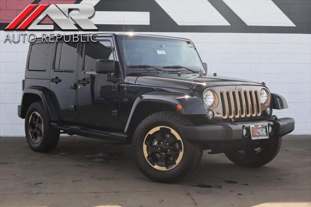 used 2014 Jeep Wrangler Unlimited car, priced at $18,991