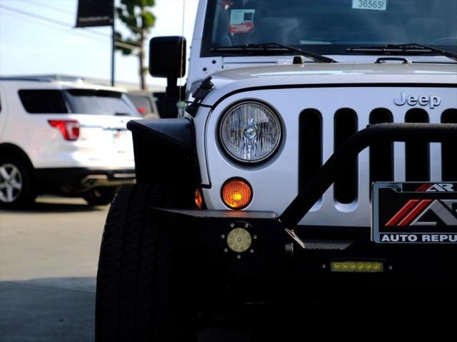 used 2012 Jeep Wrangler Unlimited car, priced at $22,341