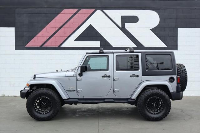 used 2018 Jeep Wrangler JK Unlimited car, priced at $21,991