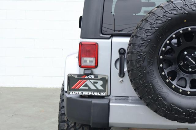 used 2018 Jeep Wrangler JK Unlimited car, priced at $21,991