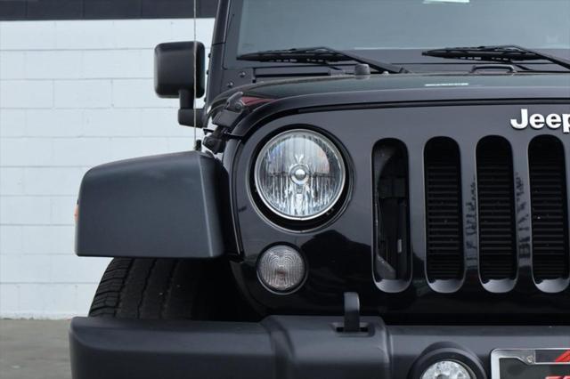 used 2016 Jeep Wrangler Unlimited car, priced at $16,991