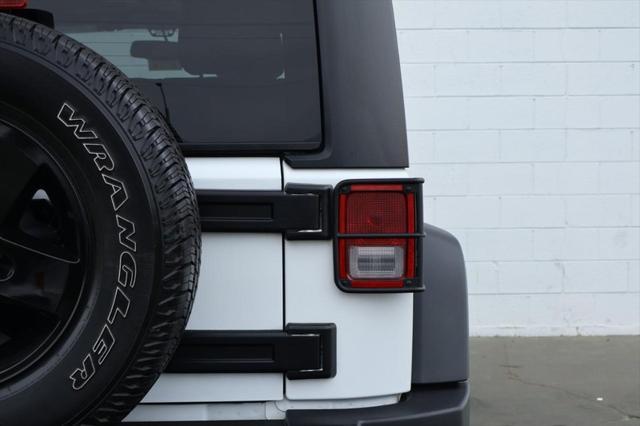 used 2018 Jeep Wrangler JK Unlimited car, priced at $21,991