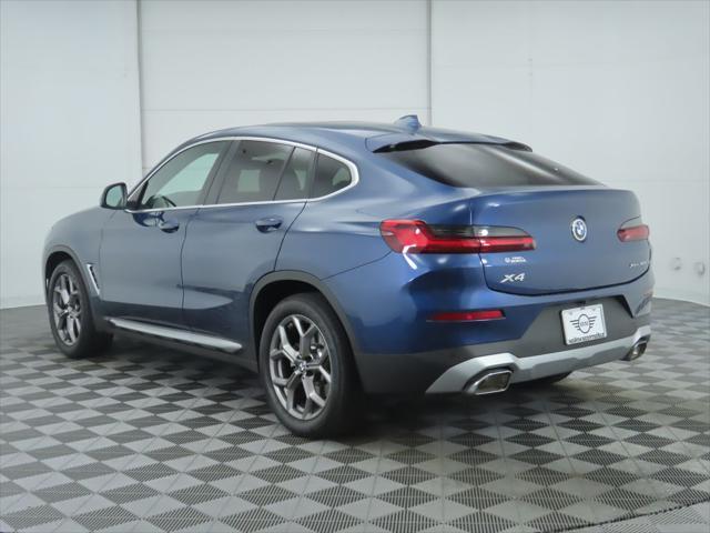 used 2022 BMW X4 car, priced at $43,281