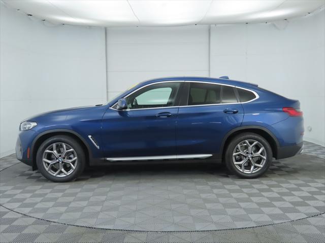 used 2022 BMW X4 car, priced at $43,281