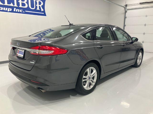 used 2018 Ford Fusion car, priced at $14,673