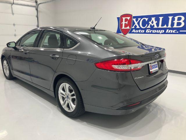 used 2018 Ford Fusion car, priced at $14,673
