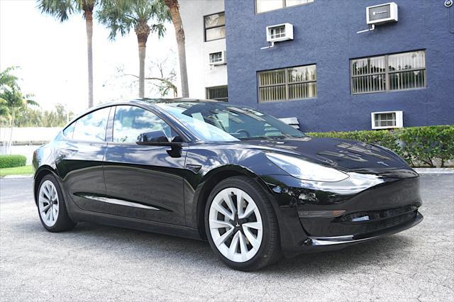 used 2023 Tesla Model 3 car, priced at $25,700