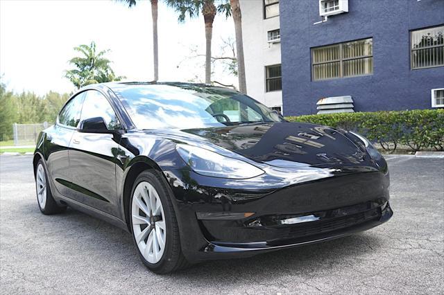 used 2023 Tesla Model 3 car, priced at $26,000