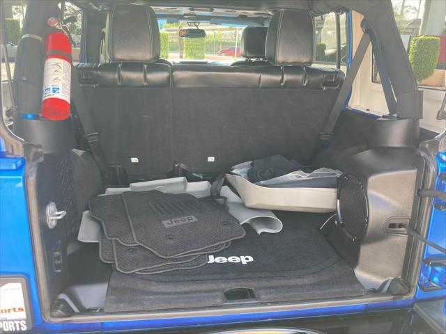used 2014 Jeep Wrangler Unlimited car, priced at $19,899