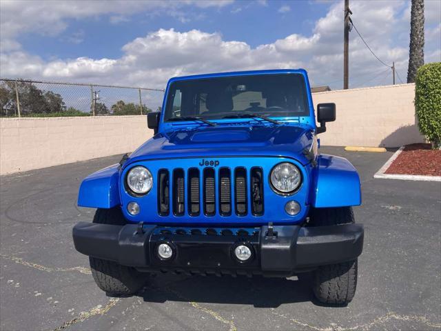 used 2014 Jeep Wrangler Unlimited car, priced at $19,899
