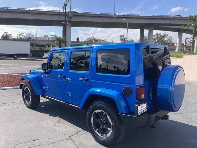 used 2014 Jeep Wrangler Unlimited car, priced at $19,899