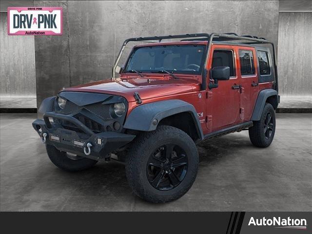 used 2009 Jeep Wrangler Unlimited car, priced at $12,977