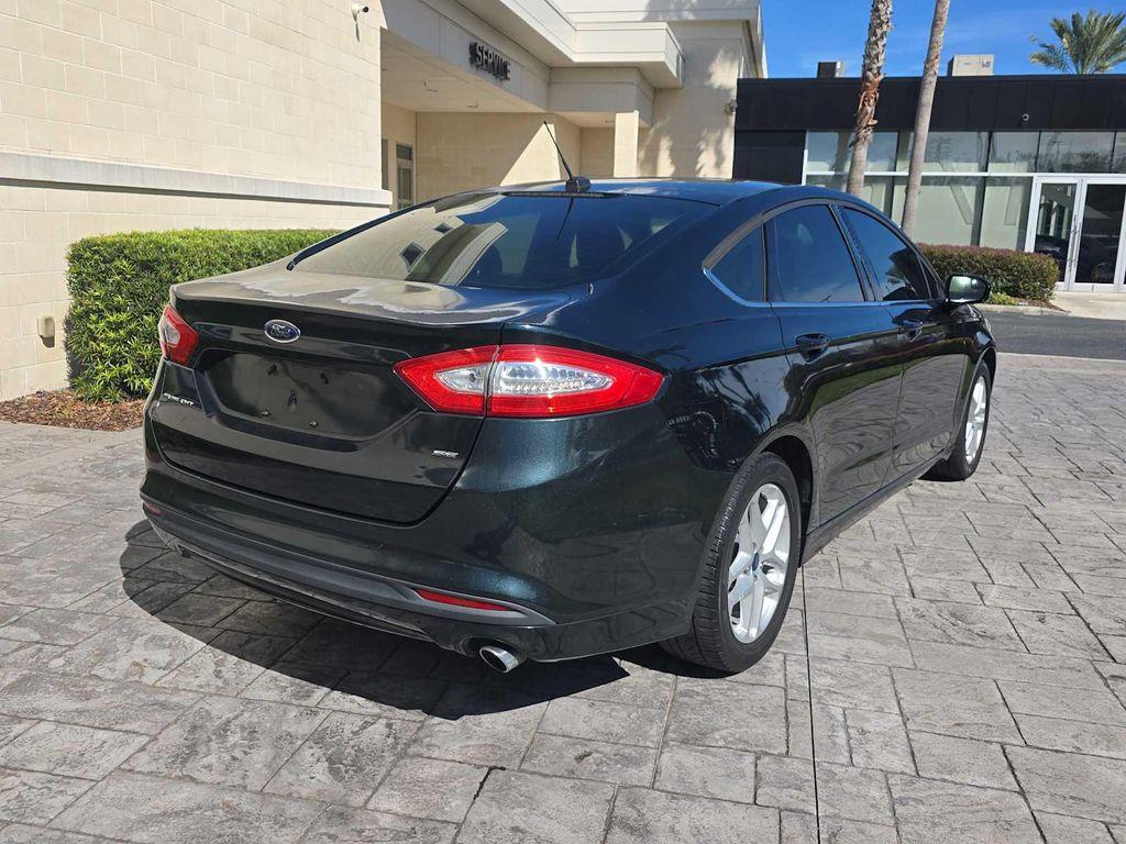 used 2014 Ford Fusion car, priced at $3,900