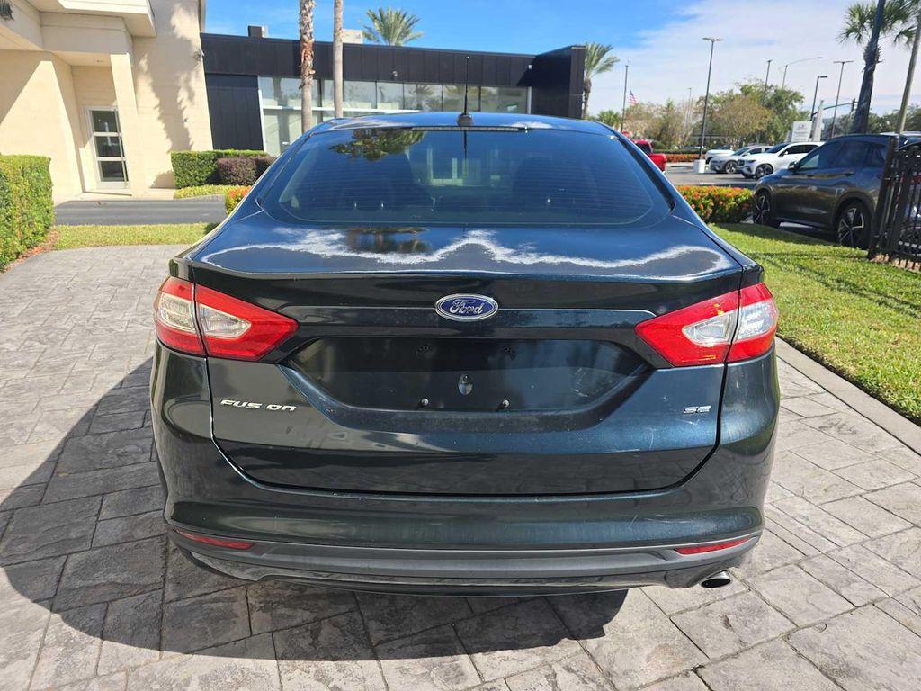 used 2014 Ford Fusion car, priced at $3,900