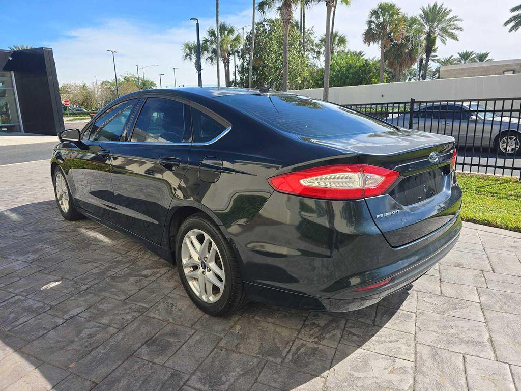 used 2014 Ford Fusion car, priced at $3,900