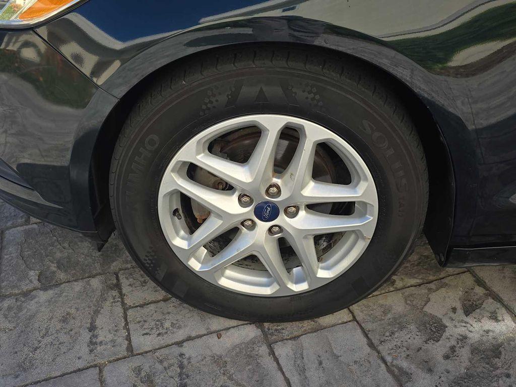 used 2014 Ford Fusion car, priced at $3,900