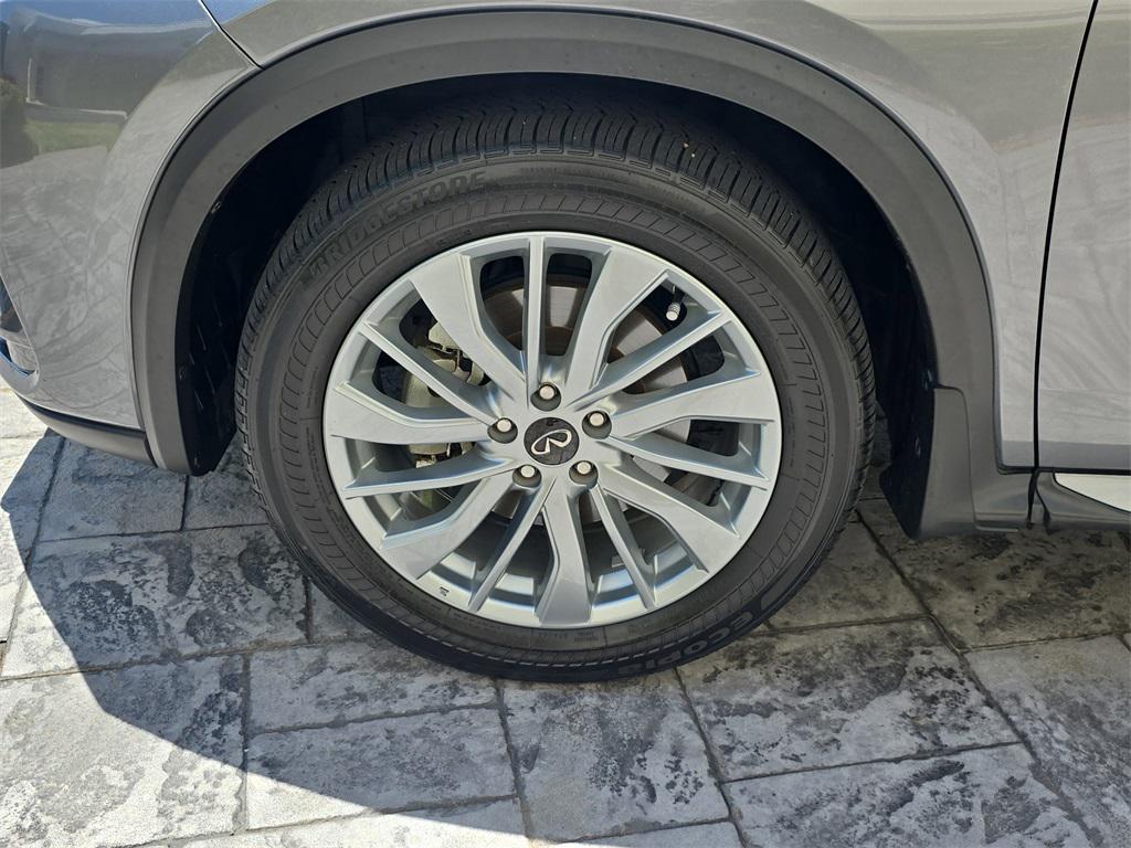 used 2024 INFINITI QX50 car, priced at $30,900