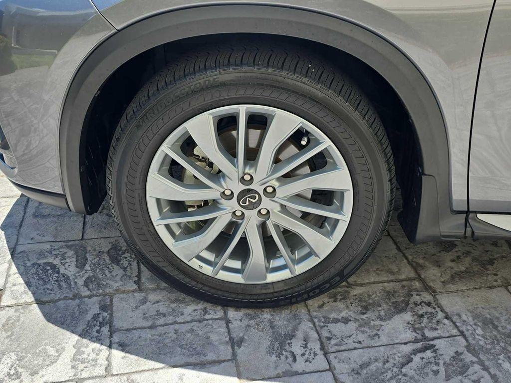 used 2024 INFINITI QX50 car, priced at $30,900