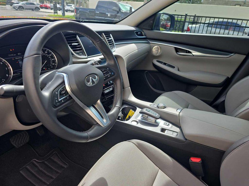 used 2025 INFINITI QX50 car, priced at $36,900