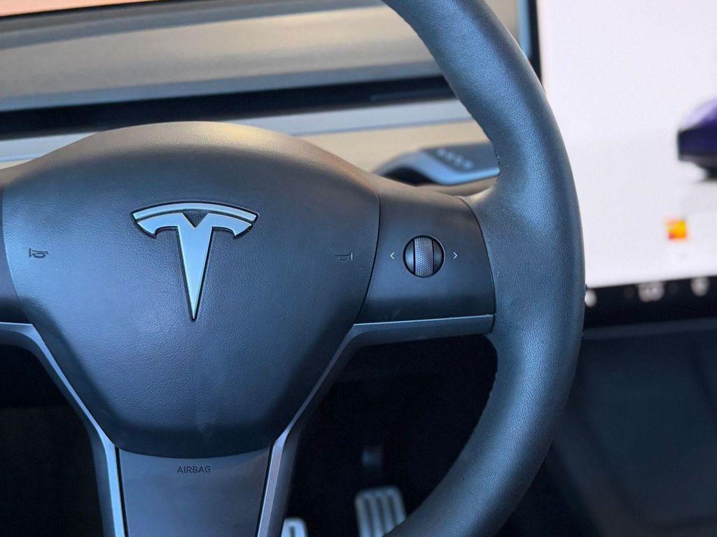 used 2023 Tesla Model Y car, priced at $29,495