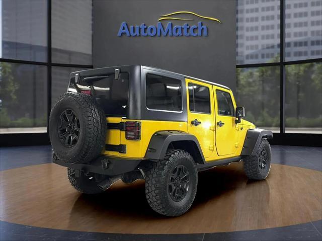 used 2011 Jeep Wrangler Unlimited car, priced at $14,995