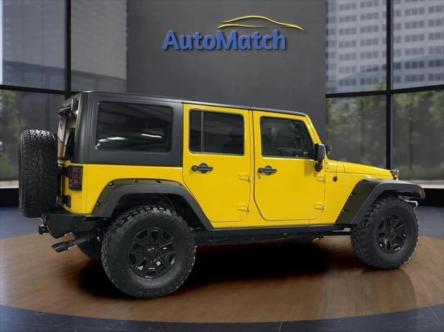 used 2011 Jeep Wrangler Unlimited car, priced at $14,995