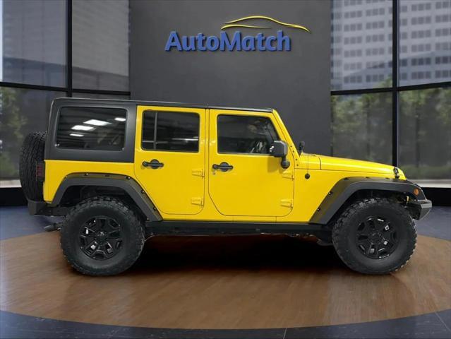 used 2011 Jeep Wrangler Unlimited car, priced at $14,995