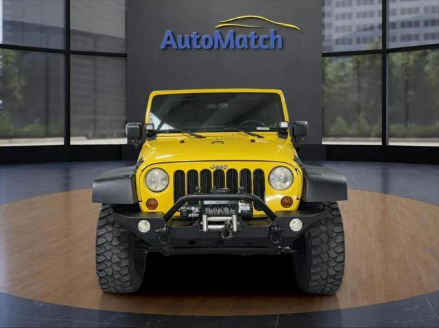 used 2011 Jeep Wrangler Unlimited car, priced at $14,995