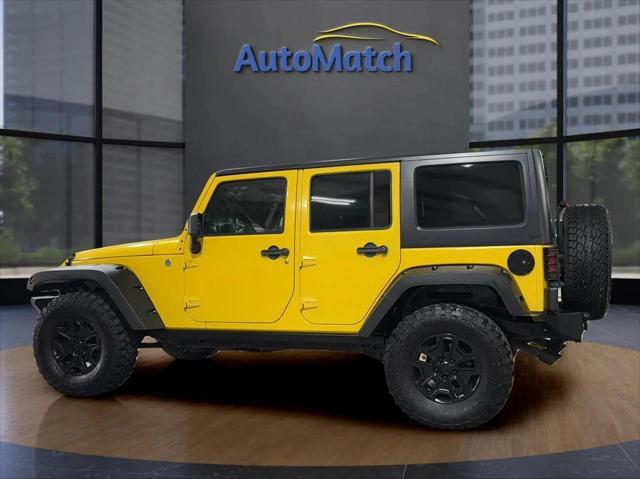 used 2011 Jeep Wrangler Unlimited car, priced at $14,995