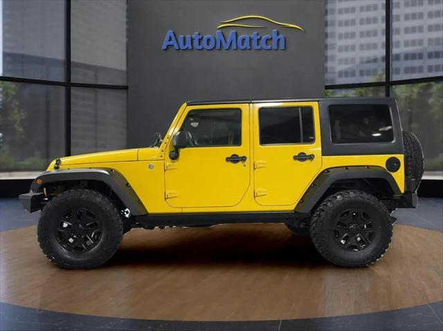 used 2011 Jeep Wrangler Unlimited car, priced at $14,995