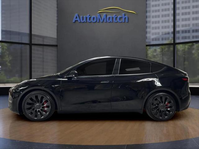 used 2024 Tesla Model Y car, priced at $32,995
