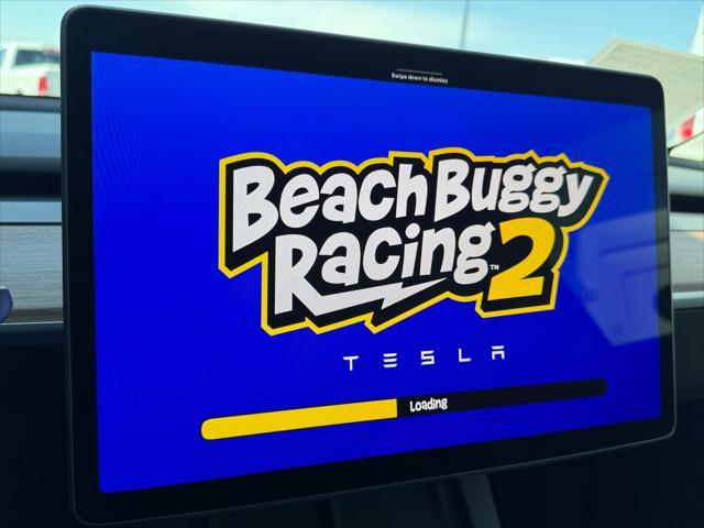 used 2024 Tesla Model Y car, priced at $32,995