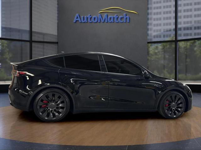 used 2024 Tesla Model Y car, priced at $32,995