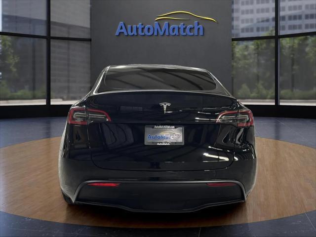 used 2024 Tesla Model Y car, priced at $32,995