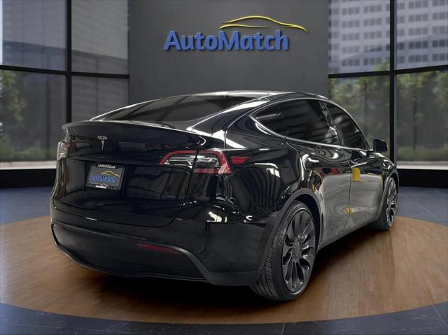 used 2024 Tesla Model Y car, priced at $32,995