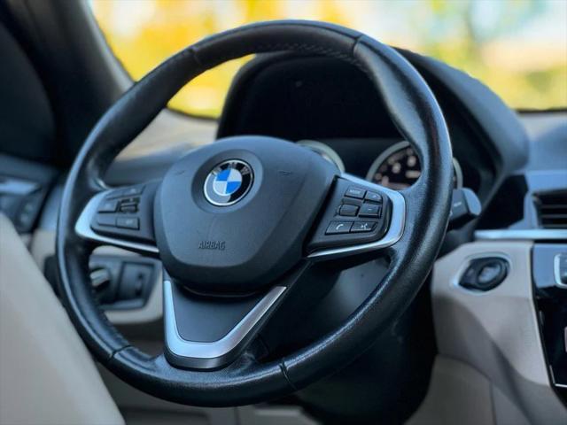 used 2018 BMW X1 car, priced at $14,495