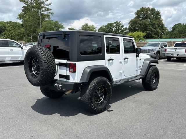 used 2017 Jeep Wrangler Unlimited car, priced at $19,596