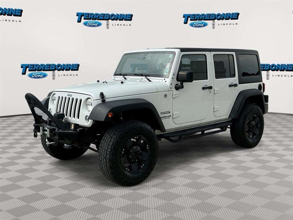 used 2015 Jeep Wrangler Unlimited car, priced at $19,318
