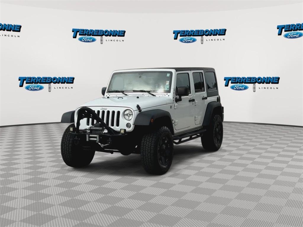 used 2015 Jeep Wrangler Unlimited car, priced at $19,318