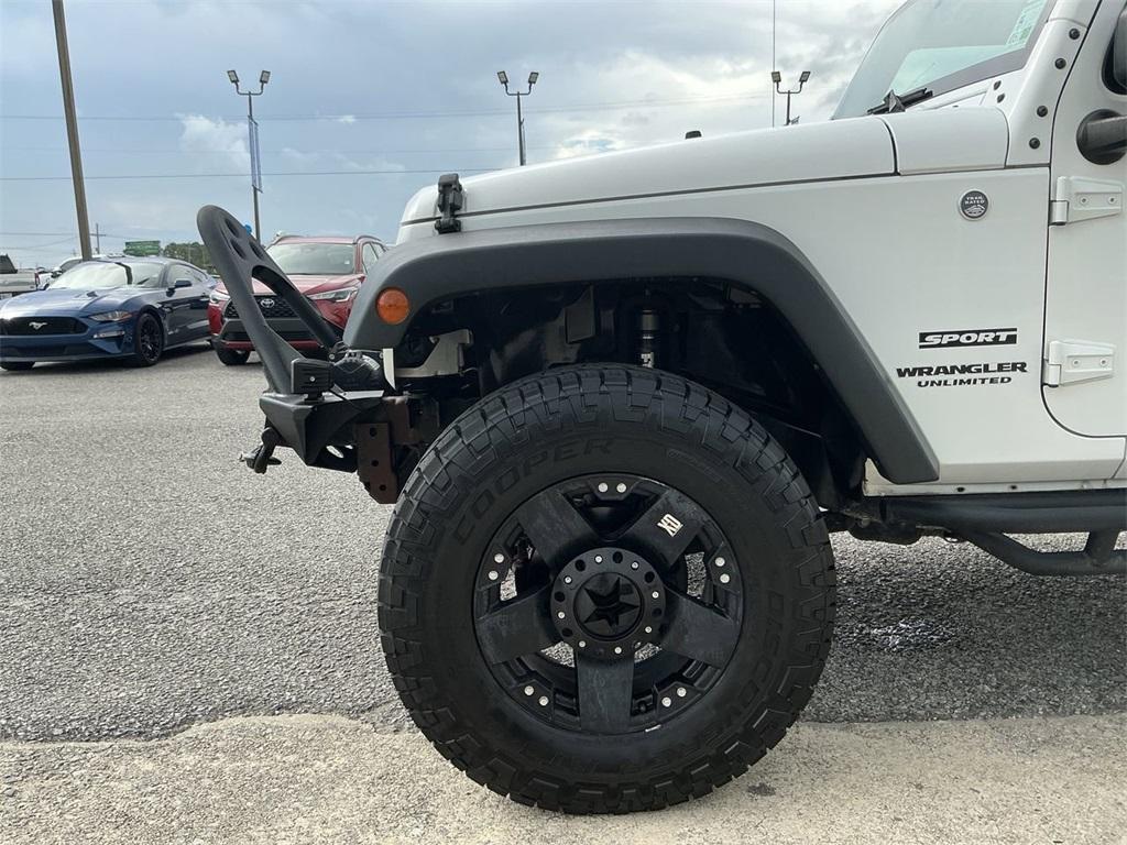 used 2015 Jeep Wrangler Unlimited car, priced at $19,318