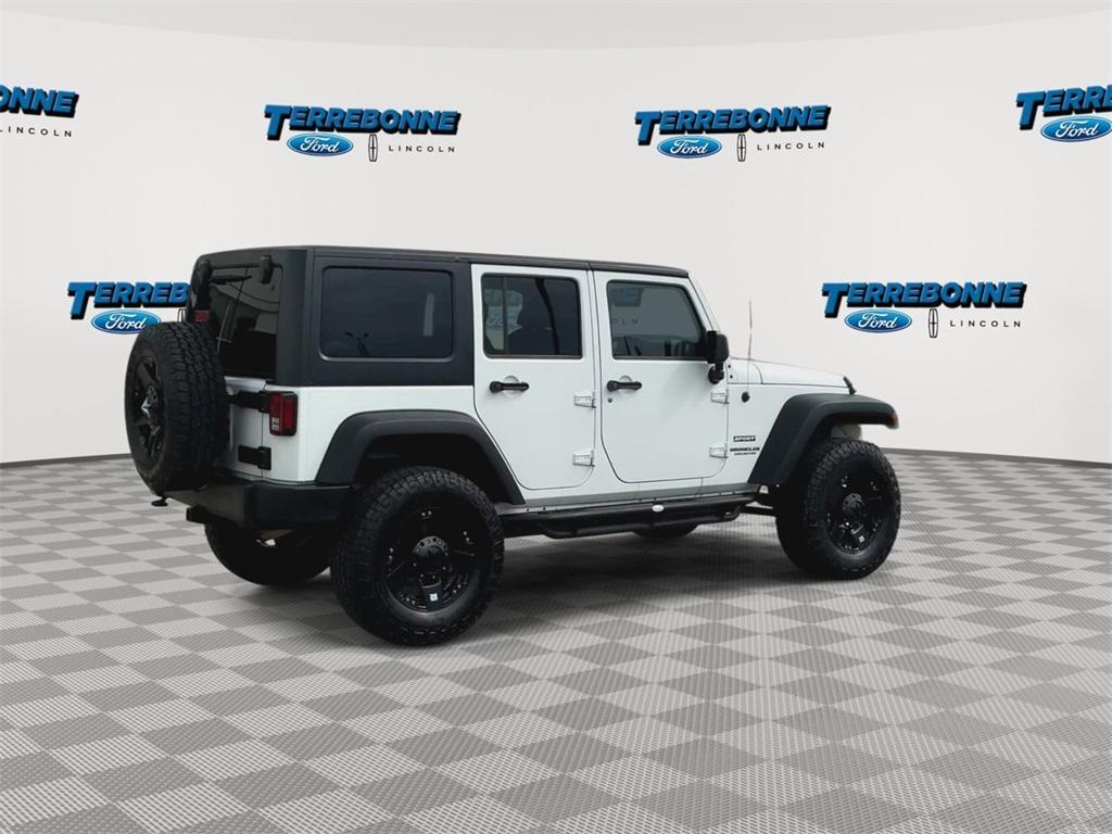used 2015 Jeep Wrangler Unlimited car, priced at $19,318