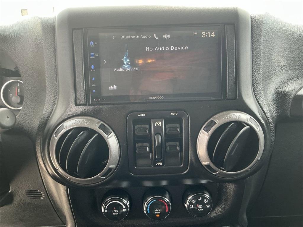 used 2015 Jeep Wrangler Unlimited car, priced at $19,318
