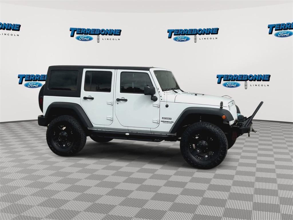used 2015 Jeep Wrangler Unlimited car, priced at $19,318