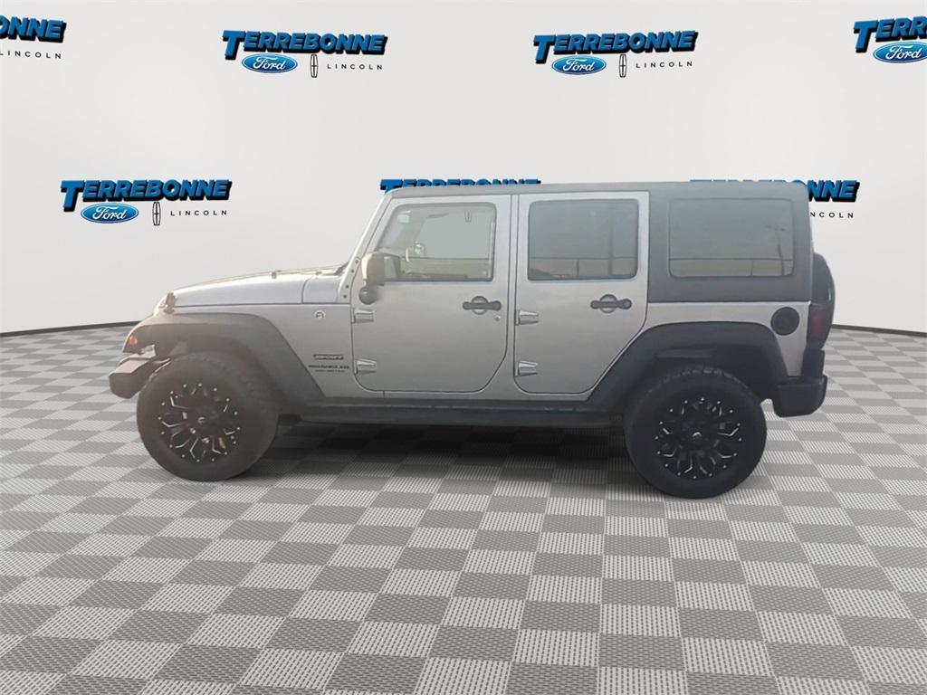 used 2017 Jeep Wrangler Unlimited car, priced at $25,124